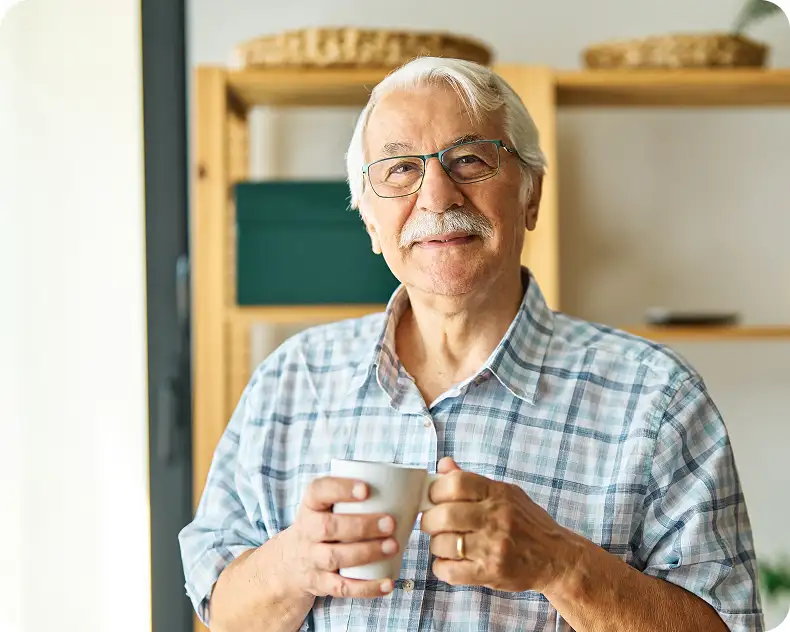 A 70 year old man with Neurolens glasses.